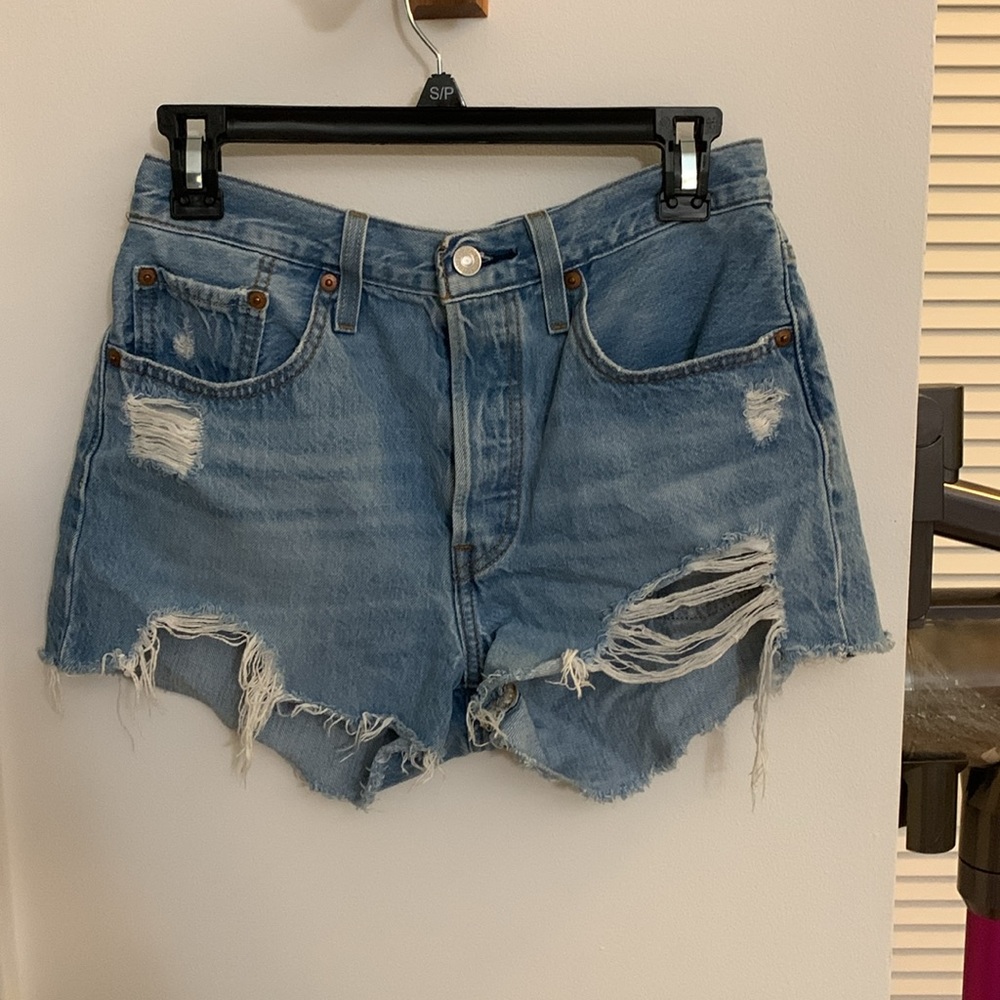 Size W27 light blue distressed Levi denim shorts